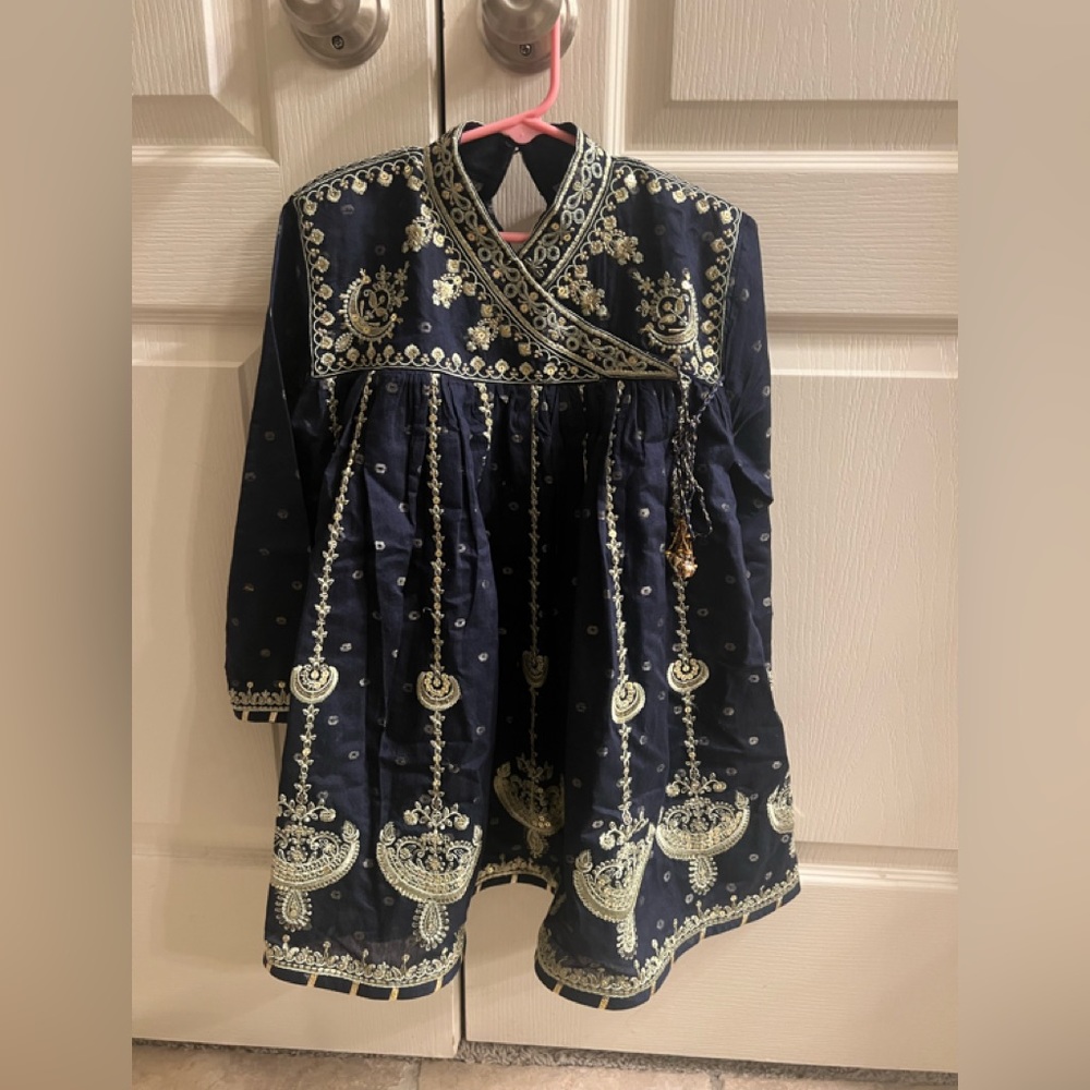 Kids fancy embroidered short frauk with embroidered capri.